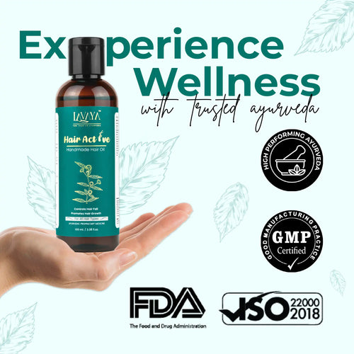 Bottle of 'Hair Active Oil' held in a hand with certification logos and text on a light green background