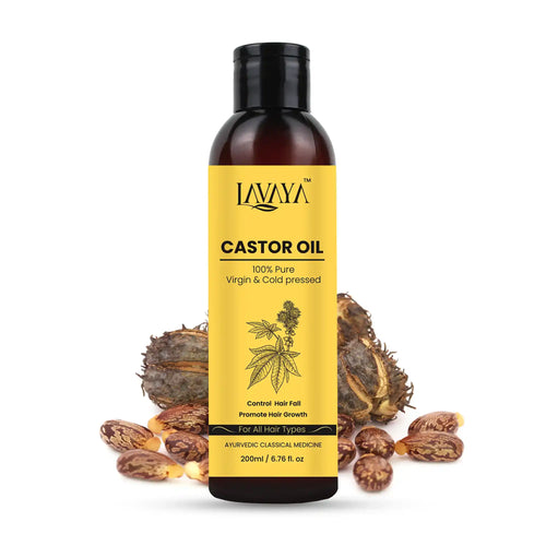 Lavaya Castor Oil bottle with yellow label and castor seeds on a white background