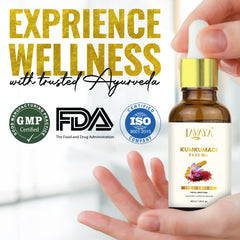 Lavaya Kumkumadi Face Oil bottle shown with GMP, FDA, and ISO certification logos, and the text experience wellness with trusted Ayurveda.