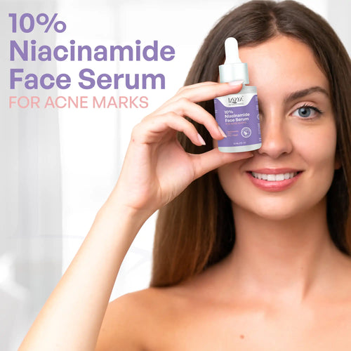 Woman holding a bottle of Lavaya 10% Niacinamide Face Serum over her eye with a white background