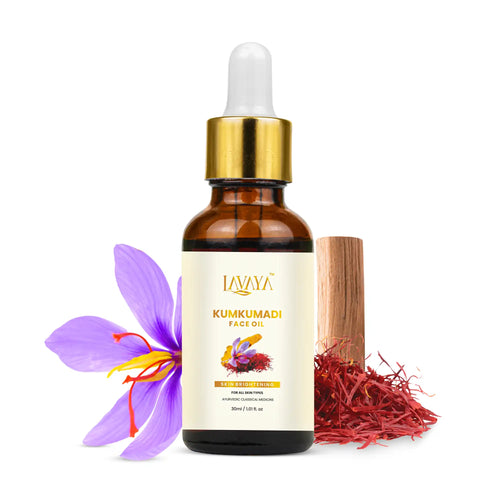 Lavaya Kumkumadi Face Oil bottle with saffron and flower on a white background